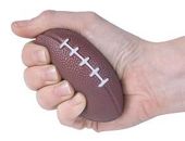 Hand holding mini football sm.jpg