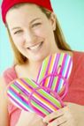 Woman holding striped flipflops sm.jpg