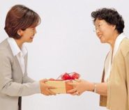 Two women with gift sm.jpg