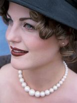 Woman wearing pearl necklace sm.jpg