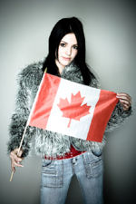 Canadianteenholdingflag.jpg